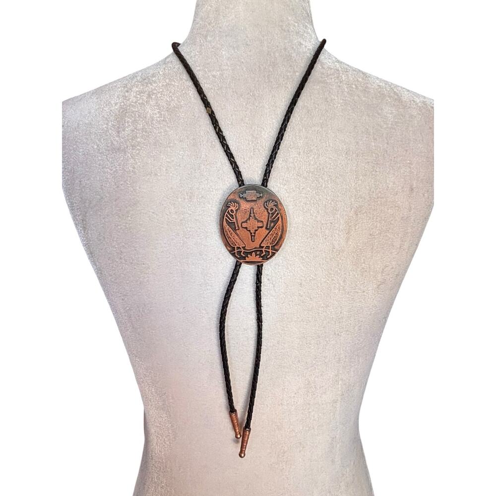 Vintage Copper Kokopelli Bolo Tie Southwestern Flute Player Black‎ Cord Tips